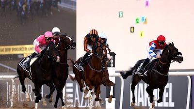 Wonder Dean, left, ridden by Cristian Demuro on way to victory in the UAE Derby. Reuters
