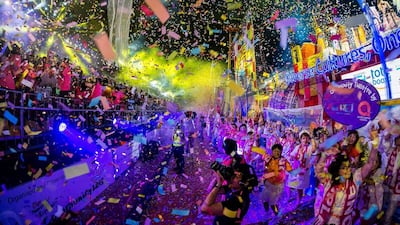 A photograph taken with a fisheye lens shows the finale of the Chingay Parade in Singapore. Tom White / EPA