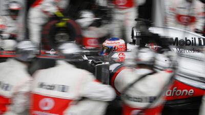 McLaren driver Jenson Button and other bigger drivers could find it difficult to keep hold of their rides after Formula One enacts new weight restrictions next season. Brandon Malone / AFP