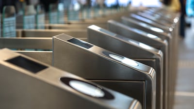 Turnstiles inside the passenger train station in Mohamed bin Zayed City
