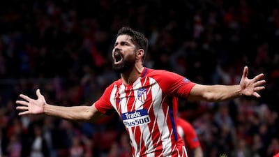 Atletico Madrid's Diego Costa celebrates scoring their winning goal against Arsenal. REUTERS/Juan Medina