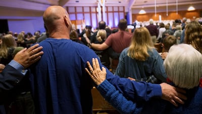 Mourners participate in a vigil for the victims of the Chabad of Poway Synagogue shooting at the Rancho Bernardo Community Presbyterian Church on April 27, 2019. AFP