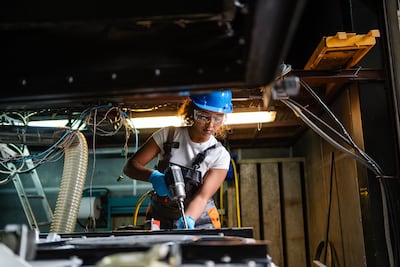 Electricians, plumbers and dental hygienists may not have glamour, but they offer something increasingly valuable: a route into paid work without a university degree. Getty Images