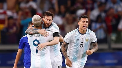 Argentina's Lionel Messi, centre, celebrates with teammates after scoring from the penalty spot in Argentina's 1-1 draw against Paraguay in Group B of the 2019 Copa America. EPA