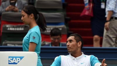 Nick Kyrgios argues with the umpire during his second round loss to Kei Nishikori at the Shanghai Masters tournament on Wednesday. Greg Baker / AFP / October 14, 2015