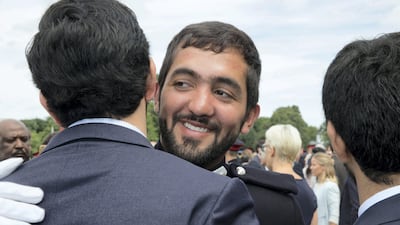 Officer Cadet Ahmed Al Mazrui from the UAE is congratulated by friends after the Sovereign's Parade at the Royal Military Academy Sandhurst where he received the International Award as the Best International Cadet. Stephen Lock for the National