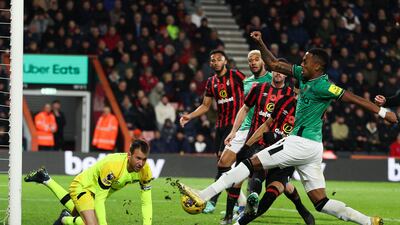 Newcastle United's Joe Willock has his shot blocked by Bournemouth goalkeeper Neto. AFP