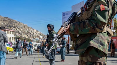 Taliban fighters at the scene of a bomb blast in Kabul, Afghanistan, in October 2021. EPA