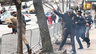 He leaps over a barrier as police give chase
