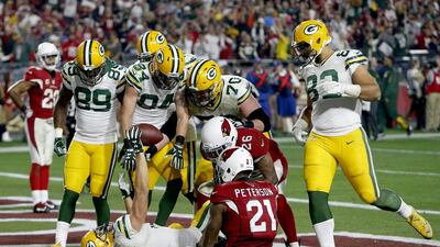 Green Bay Packers wide receiver Jeff Janis (83) holds up the football after catching a touchdown against Arizona Cardinals. Rick Scuteri / AP Photo