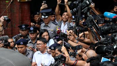 Detained Reuters journalists Wa Lone and Kyaw Soe Oo leave Insein court after listening to the verdict in Yangon. Reuters