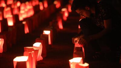 Paper lanterns in the shape of a Lebanese flag mark one month since the city's deadly explosion. Getty Images