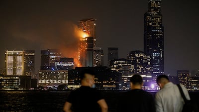 The blaze was visible from across the harbour. Reuters