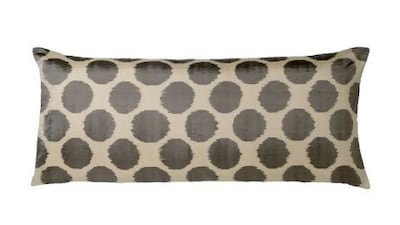 Ikat spot silk bolster cushion, £85 (Dh503).