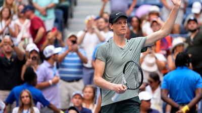 Jannik Sinner applauds the crowd after his US Open first-round win over Mackenzie McDonald. AP