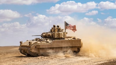 Troops from the Syrian Democratic Forces and the US-led coalition take part in military exercises in north-eastern Syria, in 2022. AFP