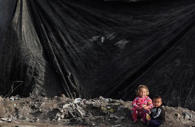 Displaced Palestinian children sheltering at a tent camp in Gaza city. Reuters