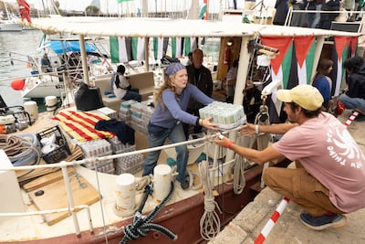 Global Sumud Flotilla vessels being loaded with supplies for Gaza, in Barcelona, before weather delayed their departure on Sunday. EPA