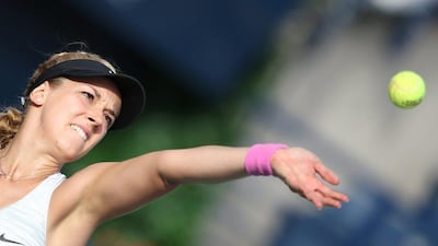 Sabine Lisicki tosses the bal to serve during her loss to Caroline Wozniacki on Tuesday. Ali Haider / EPA