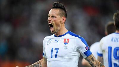 Marek Hamsik of Slovakia celebrates scoring his side's second goal against Russia in their Euro 2016 Group B match on Wednesday night in Lille. Matthias Hangst / Getty Images / June 15, 2016