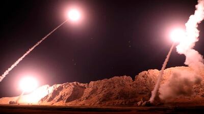 A photo released by Iran's Revolutionary Guard shows missiles being fired towards eastern Syria on October 1, 2018. Sepahnews via AP