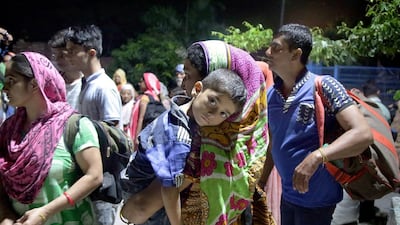 Indian border villagers arrive at a relief camp after Punjab authorities ordered them to evacuate their homes on September 29. 2016. Jaipal Singh/EPA