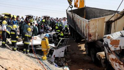At least 22 people were killed in an accident on the Old Truck Road in Al Ain after a lorry loaded with concrete overturned and landed on a bus in June. Courtesy Al Ain Police