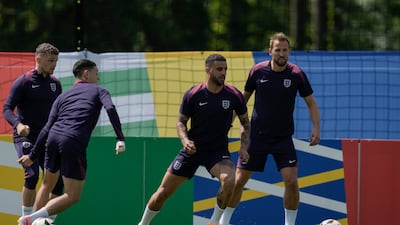 Left to right: Kieran Trippier, Phil Foden, Kyle Walker and Harry Kane during training. AP