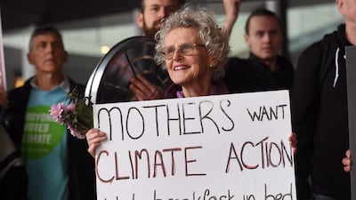Protesters demonstrate outside the Liberal Party's campaign launch where Australia's Prime Minister Scott Morrison addressed colleagues and supporters in Melbourne. AFP