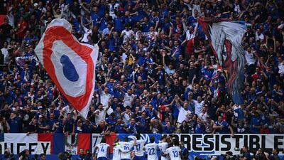 Randal Kolo Muani celebrates scoring his team's winner in front of France's fans. Getty Images
