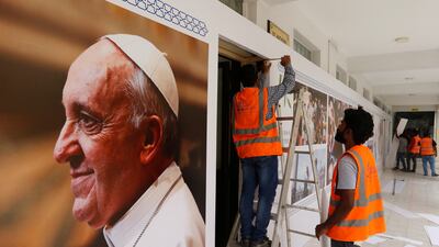 Last minute preparations at Sacred Heart Catholic Church in Manama.