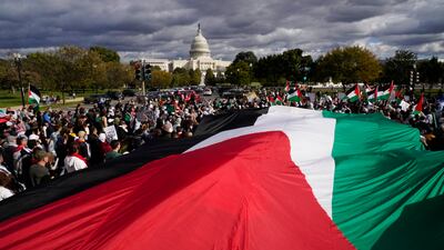 People march near the US Capitol during a pro-Palestinian march calling for a ceasefire in Gaza, on October 21, in Washington. AP