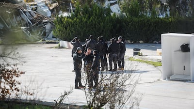 Israeli forces stationed at the UNRWA compound as it is dismantled. Reuters