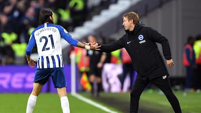 Matias Ezequiel Schelotto of Brighton with manager Graham Potter at the London Stadium. Getty Images