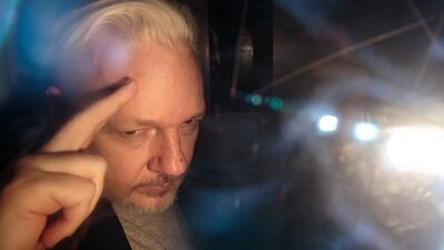 Julian Assange leaves Southwark Crown Court in a security van on May 1, 2019 in London. Getty