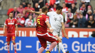 Robert Lewandowski scores the first goal. Getty