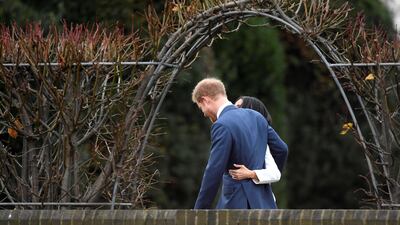 The pair pose in the Sunken Garden of Kensington Palace. Toby Melville / Reuters