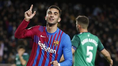 Ferran Torres celebrates after scoring for Barcelona against Osasuna at Camp Nou. EPA