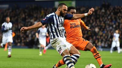 West Bromwich Albion midfielder Matt Phillips vies with Newcastle United's Danny Rose. AFP