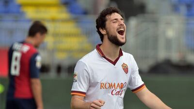 AS Roma forward Mattia Destro celebrates his third goal against Cagliari on Sunday. Gabriel Bouys / AFP / April 6, 2014