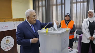 Palestinian President Mahmoud Abbas casts his vote at a polling station in Ramallah on the occupied West Bank. AFP