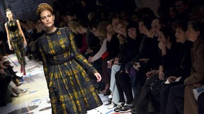 Miuccia Prada's autumn/winter collection highlighted the silhouette of the 1950s, with covered-up retro looks that nonetheless emphasise a woman's shape.