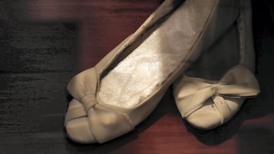 Drugs are seen hidden inside shoes at the exhibition of seizures at Dubai Airport.