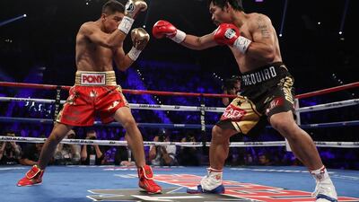 Manny Pacquiao, right, and Jessie Vargas square off during their WBO welterweight championship fight. Christian Petersen / Getty Images
