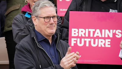 Mr Starmer sports a navy jacket and shirt at another campaign event in Blackpool