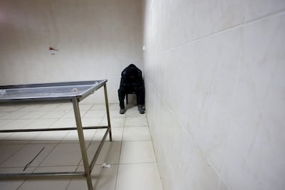 A relative mourns before the funeral of four members of the Palestinian family Bani Odeh. EPA