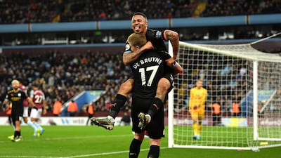 Gabriel Jesus of Manchester City celebrates with Kevin De Bruyne after scoring against Aston Villa at Villa Park on Sunday. Getty Images