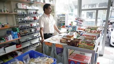 Suvarna Grocery, near Al Wahda Mall, closed on December 31 for failure to modernise under new food-safety rules, but has begun trading again. Sammy Dallal / The National