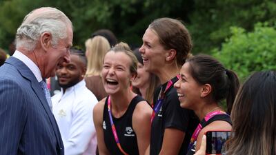 Britain's Prince Charles meets athletes and members of the New Zealand hockey team during a visit to the Athletes' Village at the University of Birmingham at the 2022 Commonwealth Games in England. AP