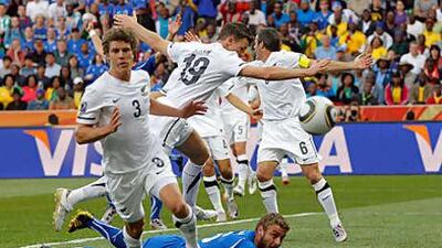 Daniele De Rossi lies on the floor after winning the penalty that was converted by Vincenzo Iaquinta.